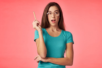 young woman with pencil