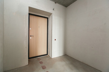 interior of the apartment without decoration in bright colors