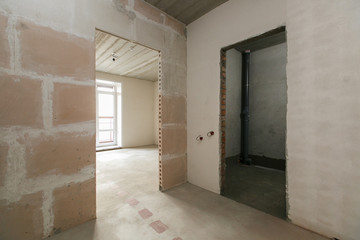 interior of the apartment without decoration in bright colors