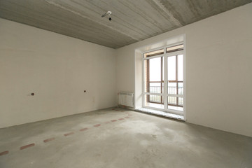 interior of the apartment without decoration in bright colors