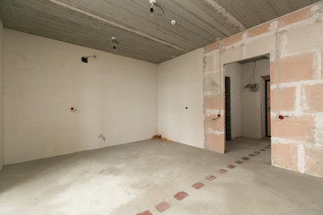 interior of the apartment without decoration in bright colors
