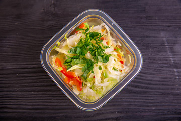 Fresh cabbage salad with greens