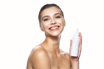 young woman with bottle of water isolated on white