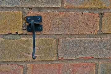Latch on a wall with copy space to the right