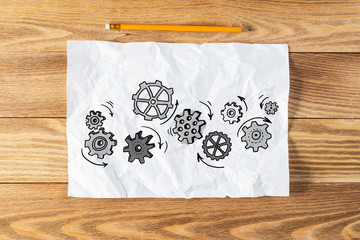Group of rotating gears pencil hand drawn
