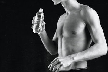 Fototapeta na wymiar man with bottle of water