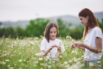 mother and daughter in the field