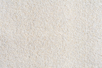 Seamless white sand background. Beach. Close-up