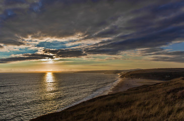 sunset on the beach in cornwall
