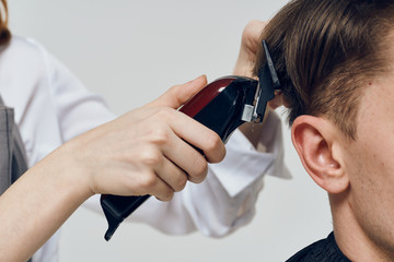 Fototapeta premium woman looking through microscope
