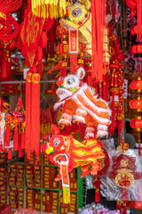 chinese traditional dancing lion hanging for New Year,calligraphy translation:good bless for money