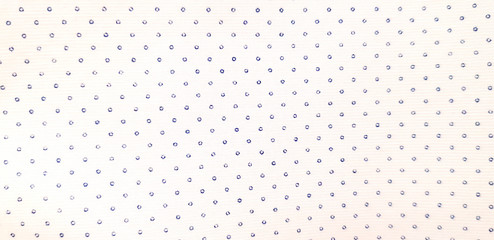 Seamless pattern of blue polka dot on white fabric or cotton for background . Art repetition wallpaper and Textured concept  