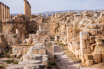 Fototapeta na wymiar Roman ruins in the Jordanian city of Jerash. The ruins of the walled Greco-Roman settlement of Gerasa just outside the modern city. The Jerash Archaeological Museum.