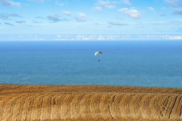 beautiful landscape of the coast in the north of France with paragliders over the English Channel