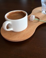 Cup of Turkish coffee with sweets