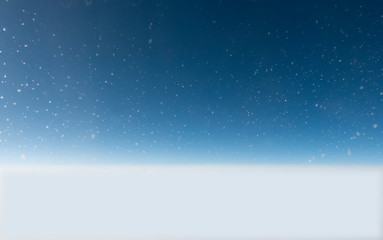 Obraz premium Background with ice crystals on blue sky