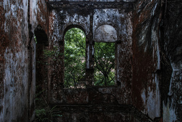 Decay walls of burned and abandoned old French church in Vietnm, urbex 