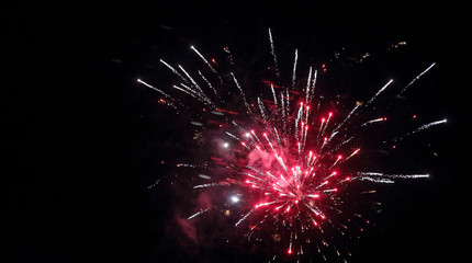Festive fireworks against the black sky
