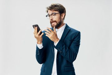 young man talking on the phone isolated on white