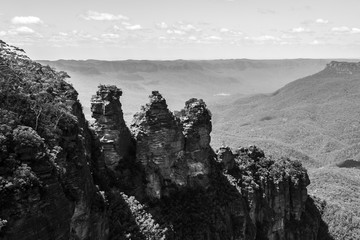 Fototapeta na wymiar Black and white landscape of Three Sisters rock is the Blue Mountains. Echo Point Katoomba, New South Wales, Australia