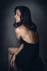 Portrait of a beautiful asia woman. Indoor portrait with studio light coming