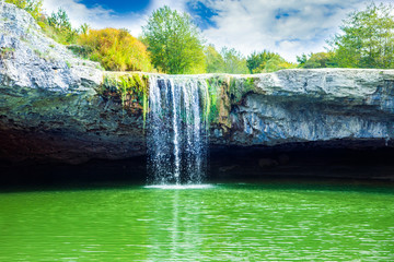 Beautiful waterfall Zarecki Krov on Pazincica River, stone cascades near Pazin in Istria, Croatia