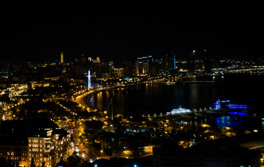 Fototapeta na wymiar A walk through the night Baku. View of the city from a height. Azerbaijan