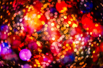Multi color mostly yellow, red, orange and blue bokeh circle shape blur abstract.