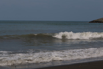 Georgia. Embankment near the railway station. Waves, sea, sun