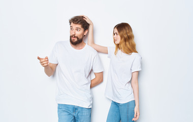 young couple in t-shirts chatting