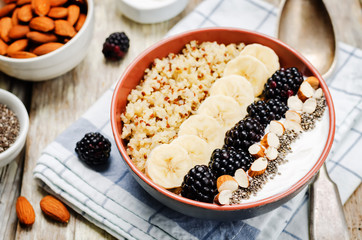 Greek yogurt almond banana Chia seeds Quinoa blackberry breakfast bowl