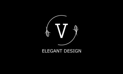 Design of modern monogram on black background with letter V. Vector floral logo.