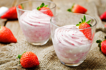 strawberry mousse on a dark wooden background