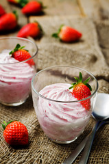 strawberry mousse on a dark wooden background