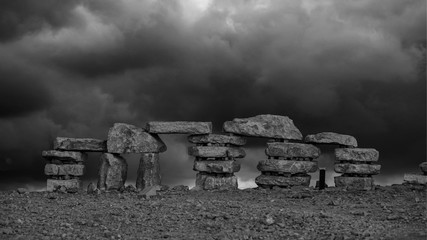 Makhtesh Ramon in Mitzpe Ramon stone sculptures Negev desert of southern Israel in black and white 