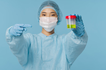 doctor in mask with syringe