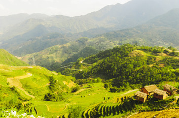 Scenic view of Y Linh Ho valley with rice terraces surrounded with mountains by Sapa, Vietnam 