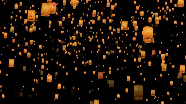 Floating lanterns isolated on black background. Yee Peng Festival celebration 4k slowmotion.