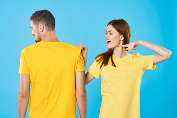 Fototapeta premium young couple in t-shirts chatting