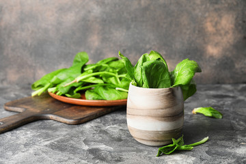 Fresh green spinach on table