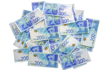 Israeli money stack of the new Israeli money bills (banknotes) of 200 shekel isolated on a white background. New Israeli Shekel series C.