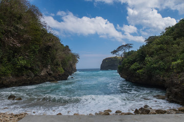 Secret Rocky Beach With Bright Turquoise Water Hidden In A Valley Named Bulian Beach In Nusa...
