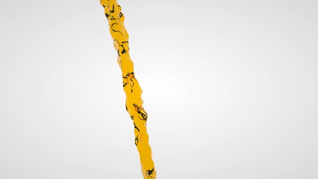 A single stream of yellow gasoline is pouring on a white background.