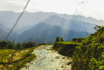 Scenery of Y Linh Ho valley with rice terraces surrounded with mountains by Sapa, Vietnam