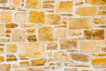 Old stone brick wall pattern texture background. Old wall of ancient architecture. Background of ancient stone wall. Texture of old brick. Roman architecture. Old wall made of the Jerusalem stone