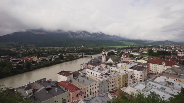 Establishing shot, looking down at the smallest town, Rattenberg in Austria on a cloudy day.