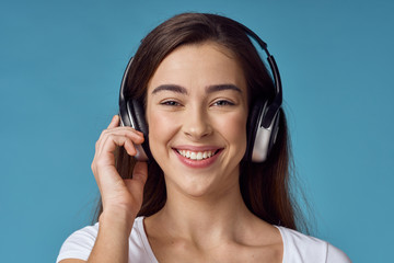 Fototapeta premium young woman listening to music