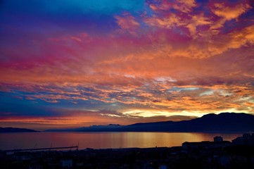 Sunset over the city Rijeka and Adriatic sea in Croatia