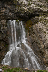 Fototapeta na wymiar Abkhazia. Jeep trip to the mountains. The Gega waterfall, lake Riza
