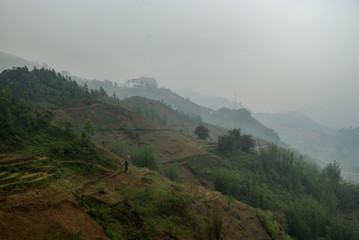 Morning fog over Sapa town and rice terraces, Vietnam 